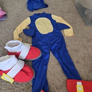 Blue and Yellow Costume with Red Accessories